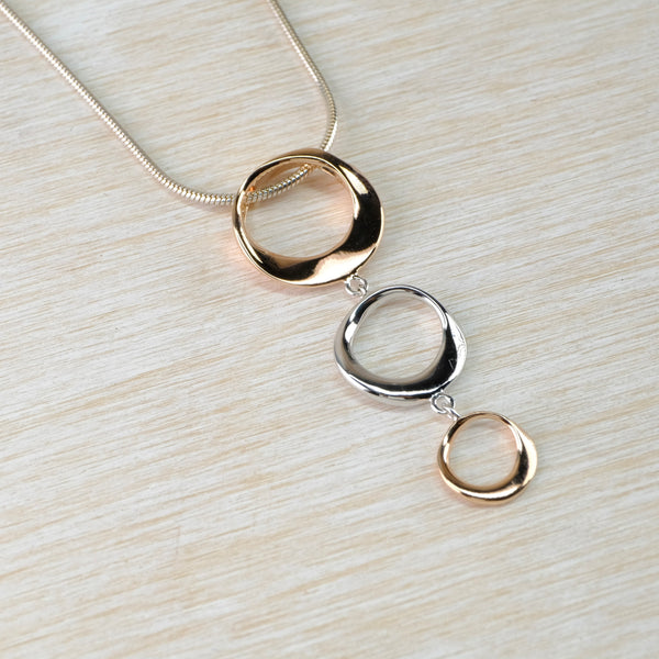 Sterling Silver and Gold Plated Triple Circle Pendant by JB Designs.
