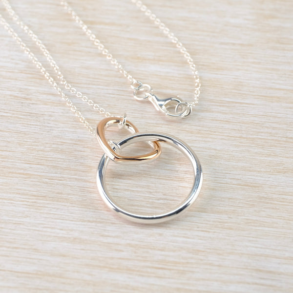 Silver Circle and Gold Plated Heart Necklace.