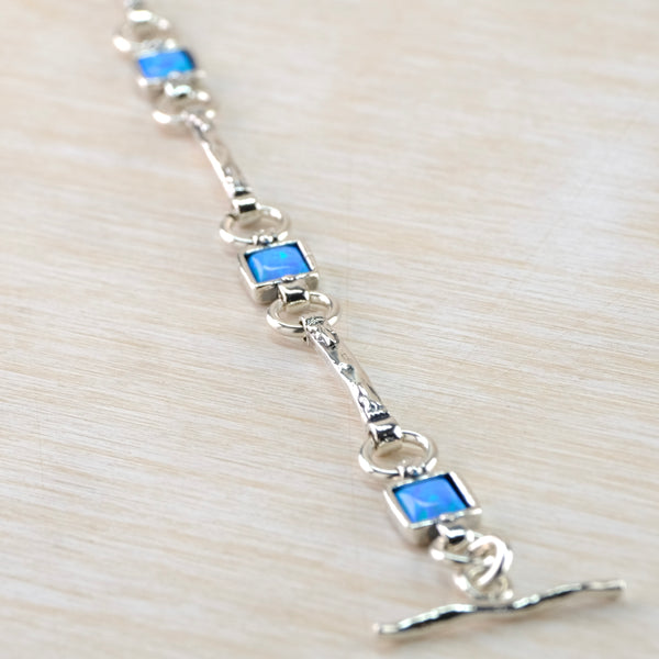 Silver and Square Opal Linked Bracelet.