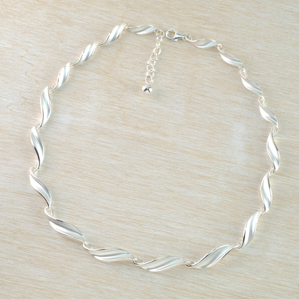 Satin Silver Curved Linked Necklace by JB Designs.