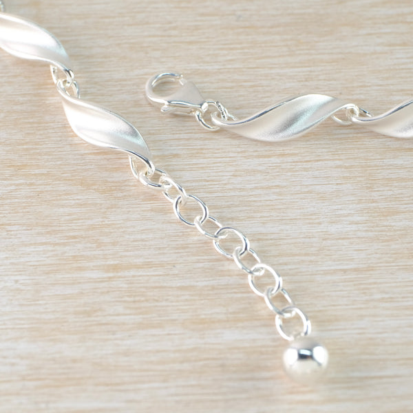 Satin Silver Curved Linked Necklace by JB Designs.