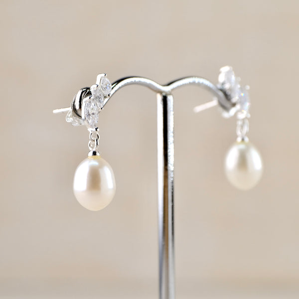 Freshwater Pearl Drop Earrings in Silver Set With CZ Stones.