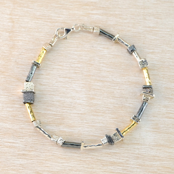 Silver and Rolled Gold Linked Bracelet by JB Designs.