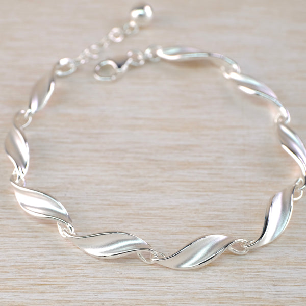 Silver Bracelet with Leaf Twist Links by JB Designs.