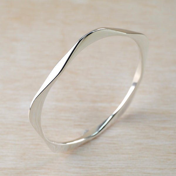 Curves Sterling Silver Bangle.
