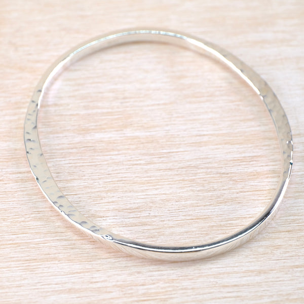 Hammered Flattened Edge Sterling Silver Bangle.