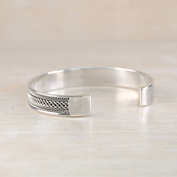 Sterling Silver Torque Bangle Bracelet with Decorative Detail.