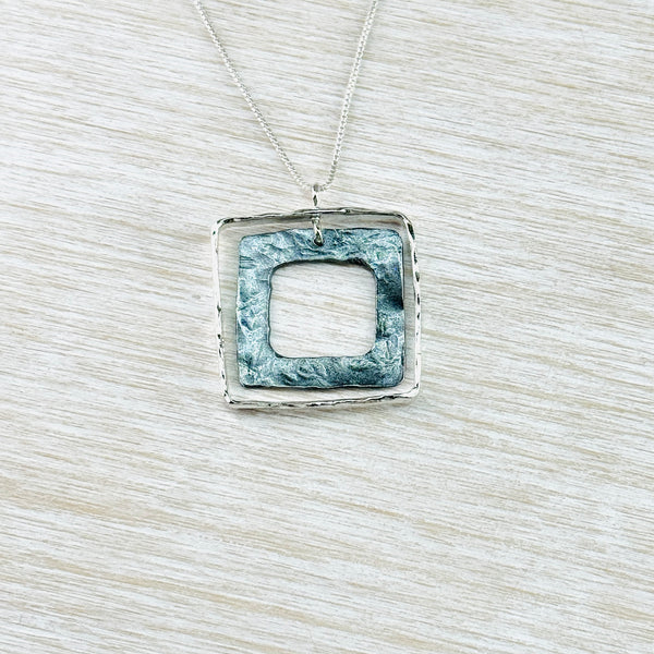 Articulated Square Pendant in Polished and Oxidised Silver by JB Designs. Articulated Square Pendant in Polished and Oxidised Silver by JB Designs.