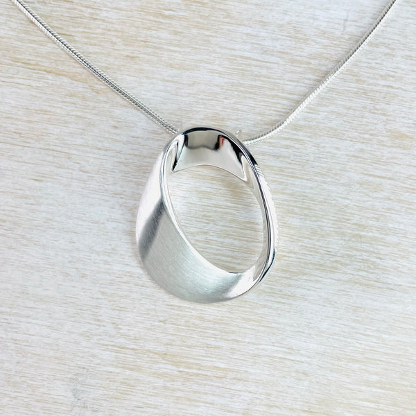 Brushed and Polished Silver Mobius Pendant by JB Designs.