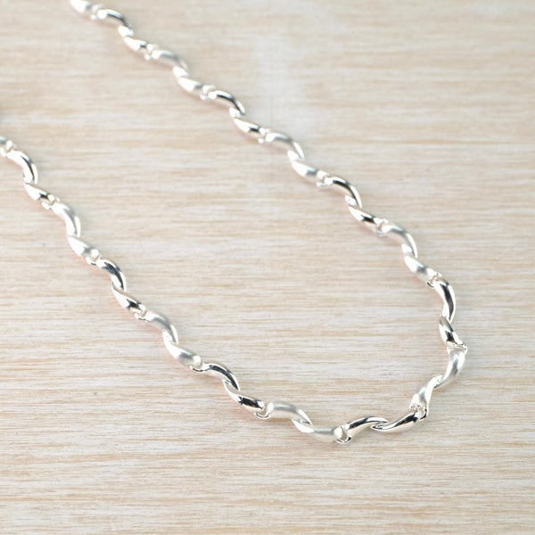 Sterling Silver Polished and Matt Twists Design Necklace by JB Designs.