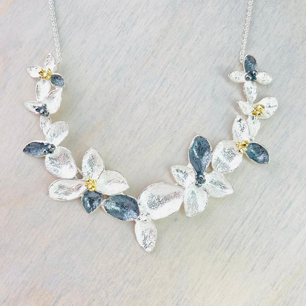 Silver and Gold Plated Flower Necklace by JB Designs. Silver and Gold Plated Flower Necklace by JB Designs.