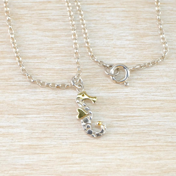 Silver Seahorse Pendant with Gold-Plated Details.