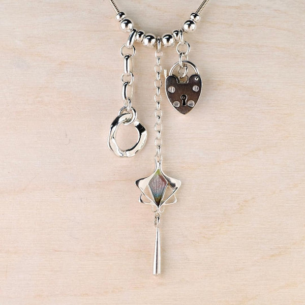 Sterling Silver Vintage Charms Necklace by Emily Merrix.