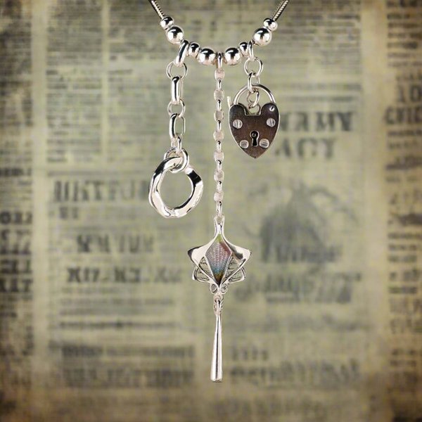Sterling Silver Vintage Charms Necklace by Emily Merrix.