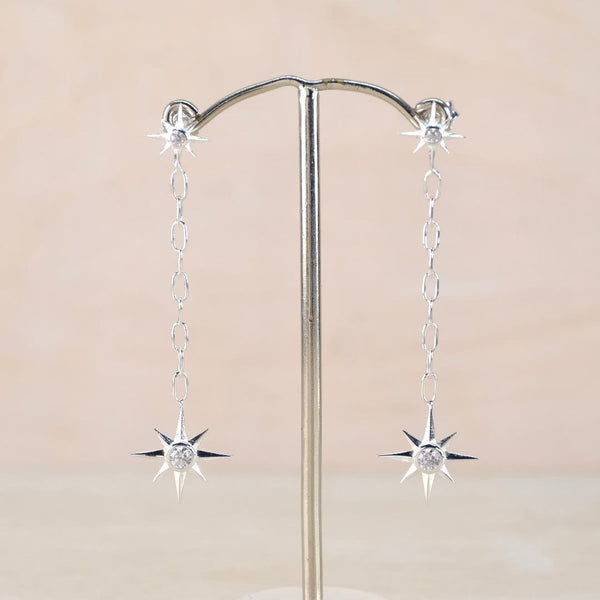 Silver Star Dangly Earrings with Cz by JB Designs.