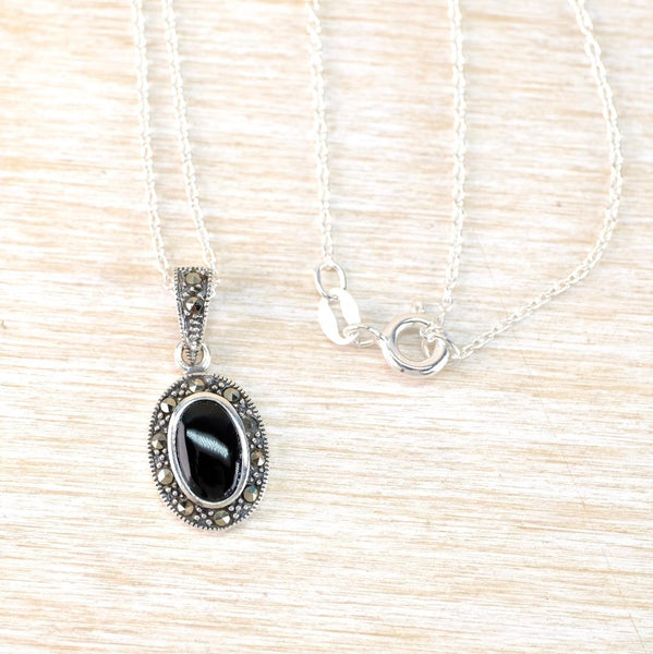 Silver, Marcasite and Black Onyx Oval Pendant Necklace.