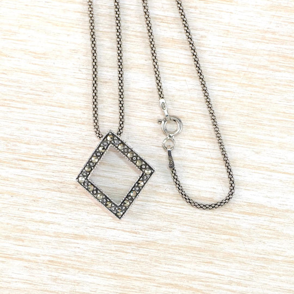 Silver and Marcasite Open Diamond Shape Pendant.