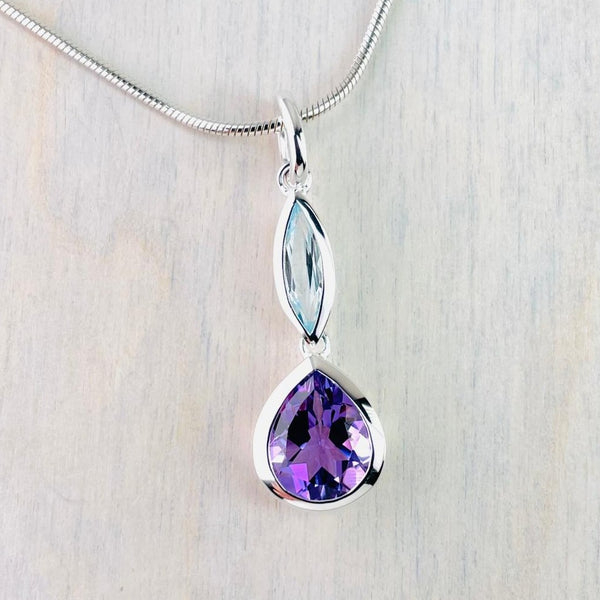 Sterling Silver, Blue Topaz and Amethyst Pendant.