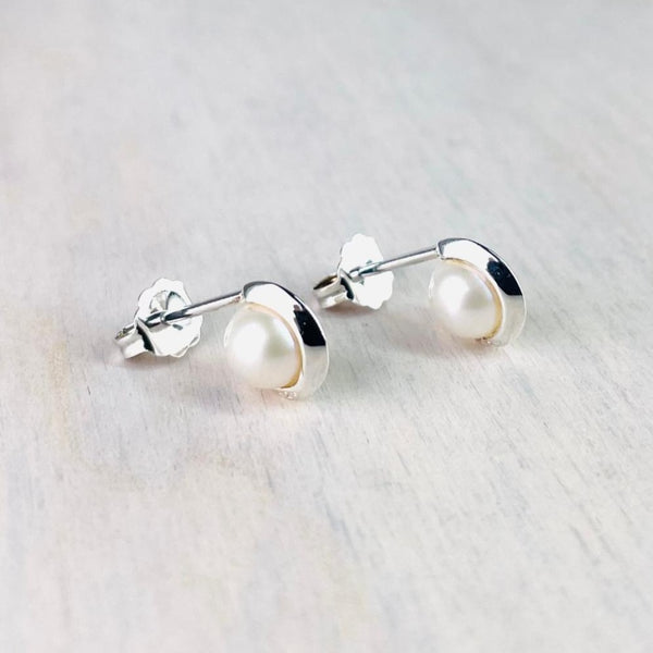 Silver and Round Freshwater Pearl Stud Earrings.