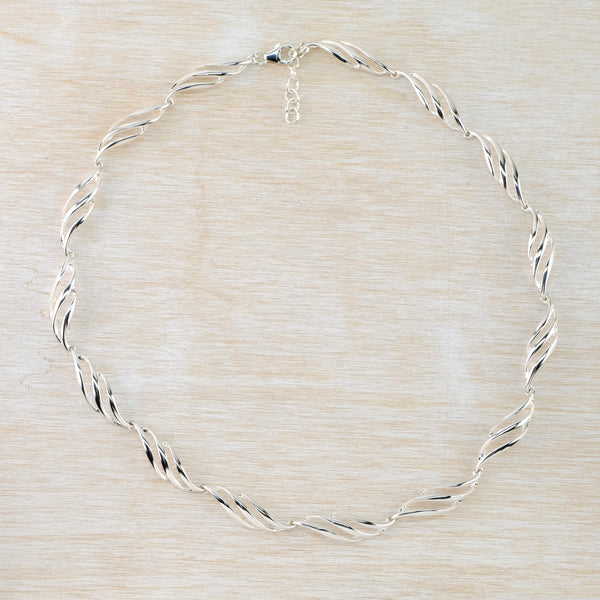 Sterling Silver Open Wave Linked Necklace by JB Designs. Sterling Silver Open Wave Linked Necklace by JB Designs.