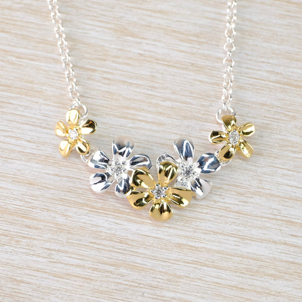 Multi Flower Necklace in Sterling Silver by 'JB Designs'. Multi Flower Necklace in Sterling Silver by 'JB Designs'.