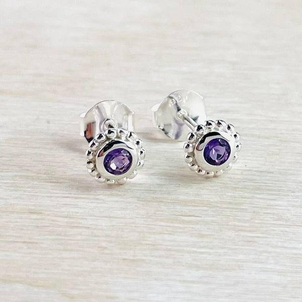 Small Sterling Silver and Amethyst Stud Earrings.