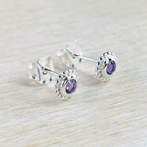 Small Sterling Silver and Amethyst Stud Earrings.