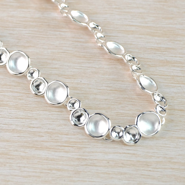 Sterling Silver Matt and Polished Discs Bracelet by JB Designs.