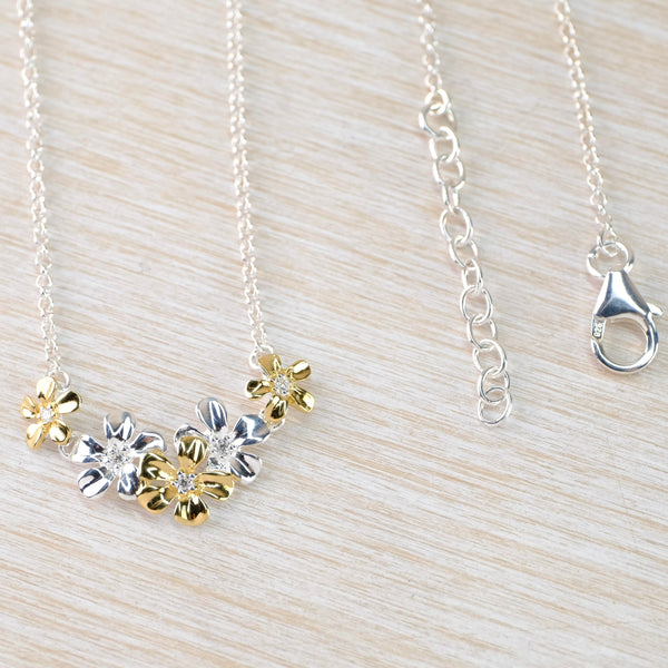 Multi Flower Necklace in Sterling Silver by 'JB Designs'.