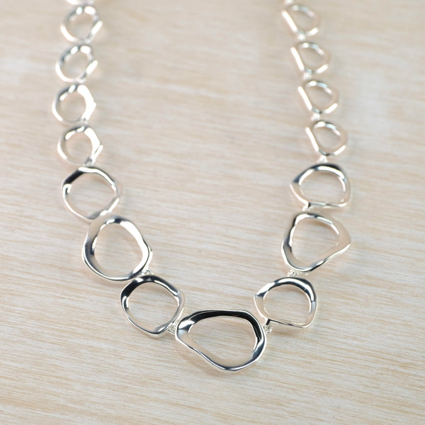 Sterling Silver Abstract Open Pebble Design Necklace by JB Designs.