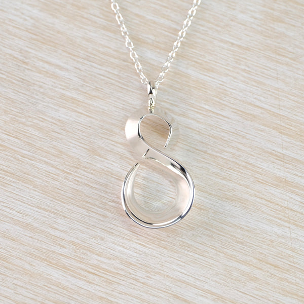 Polished Sterling Silver Figure of Eight Pendant.