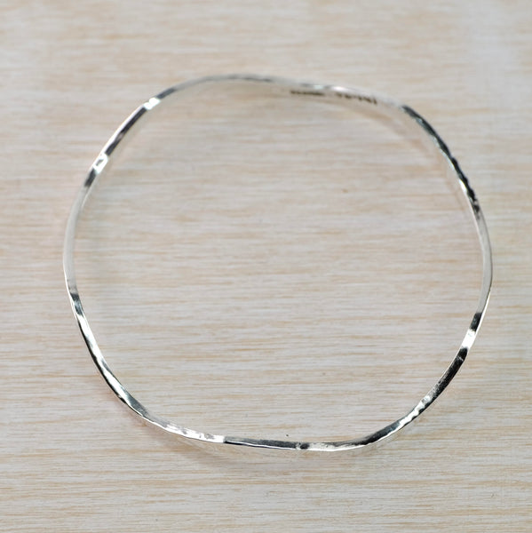 Flat Hammered And Wavy Sterling Silver Bangle.
