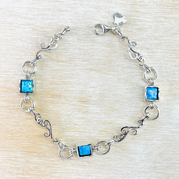 Sterling Silver Scroll and Square Opal Linked Bracelet.