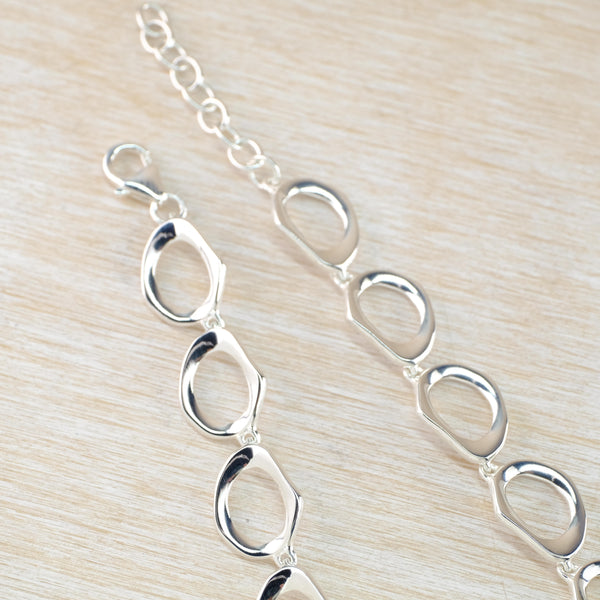 Sterling Silver Abstract Open Pebble Design Necklace by JB Designs.