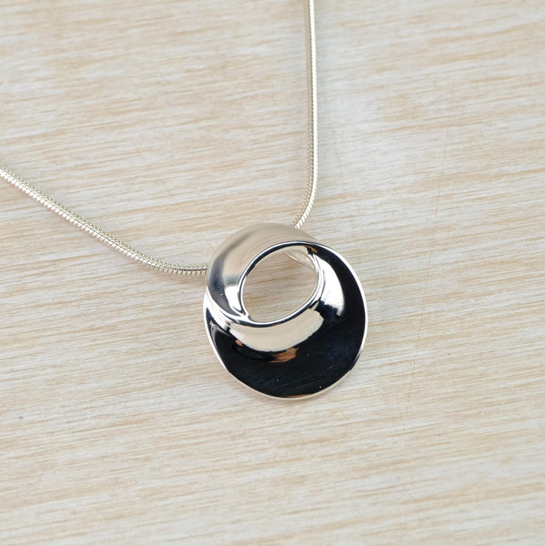 High Polished Open Oval Twist Sterling Silver Pendant.