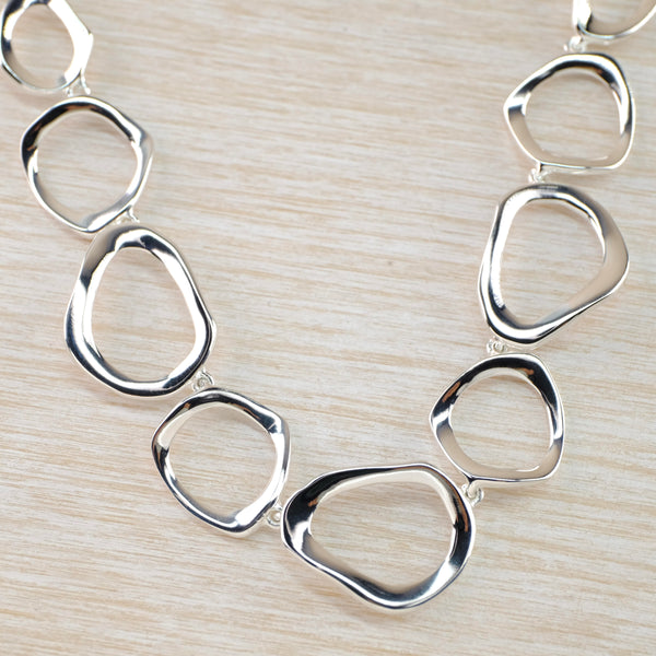 Sterling Silver Abstract Open Pebble Design Necklace by JB Designs.