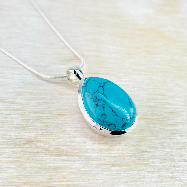 Chunky Sterling Silver and Tear Drop Shaped Turquoise Pendant.