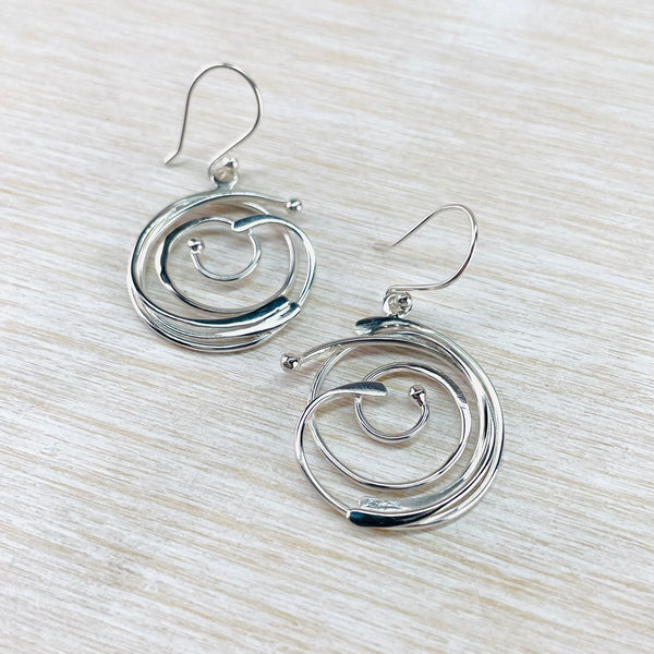Sterling Silver Double Swirl Drop Earrings.