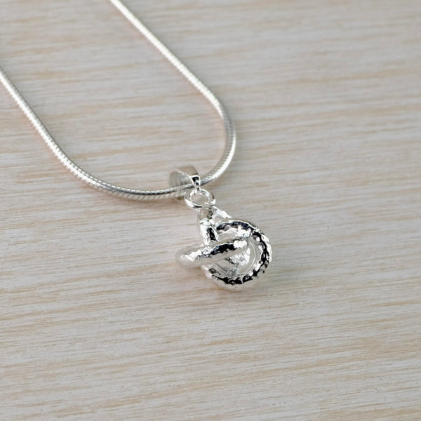 Hammered Sterling Silver Knot Pendant by JB Designs.
