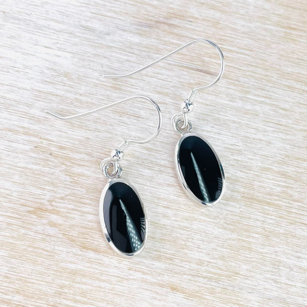 Sterling Silver and Oval Black Onyx Drop Earrings.