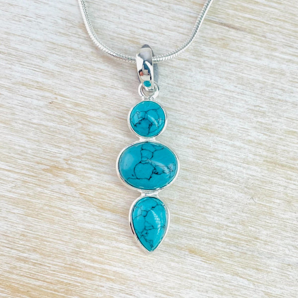 Sterling Silver and Three Shaped Turquoise Pendant.
