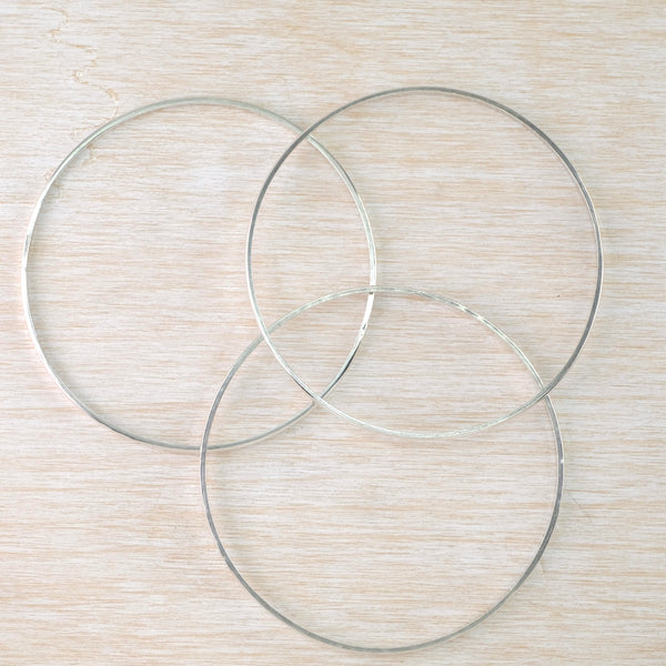 Set of 3 Separate Sterling Silver Bangle Bracelets.