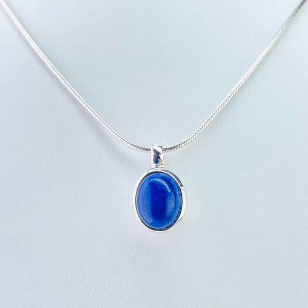 Silver and Simple Oval Shaped Lapis Lazuli Pendant.