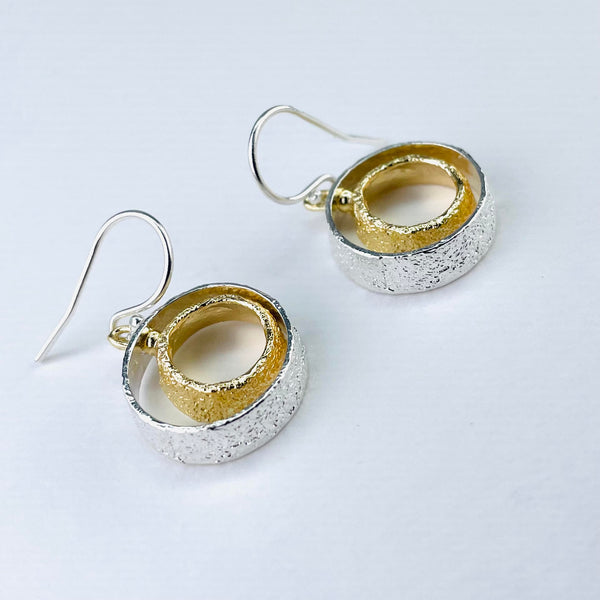 Articulated Sterling Silver and Gold Plated Circle Drop Earrings by JB Designs.