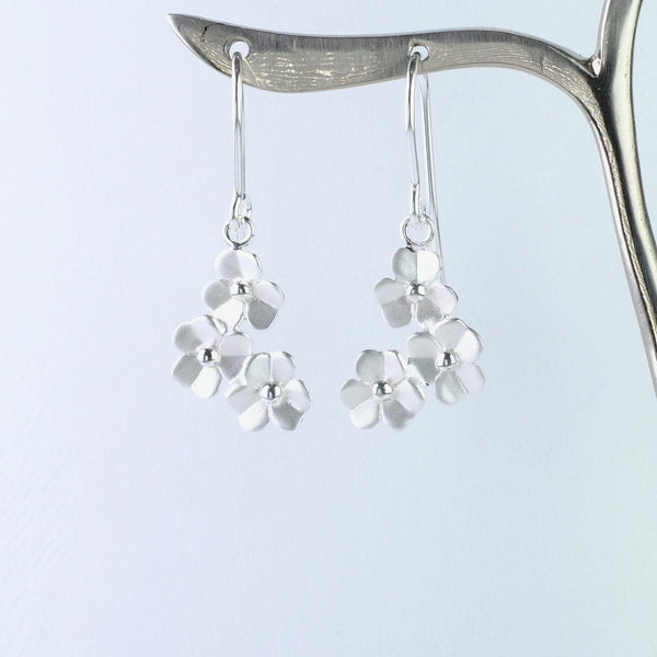 Satin Silver Flower Drop Earrings by JB Designs.