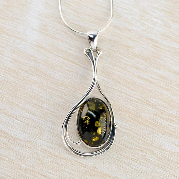 Art Nouveau Style Green Amber and Sterling Silver Pendant.