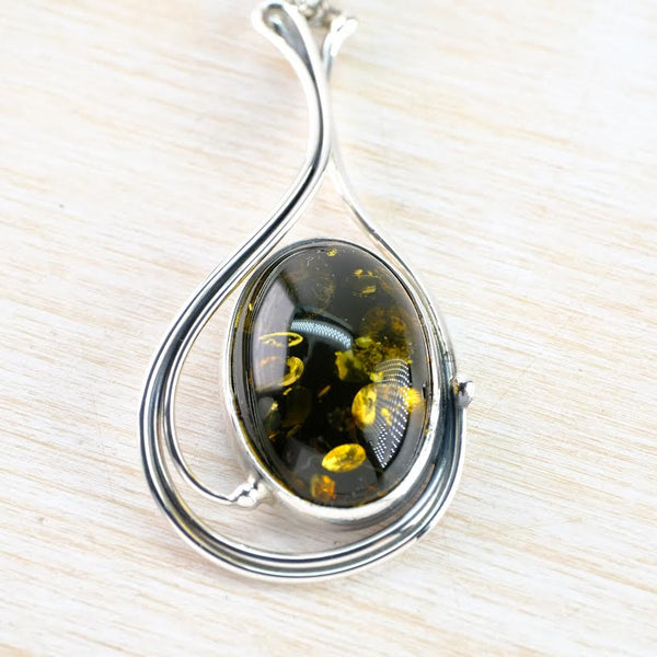Art Nouveau Style Green Amber and Sterling Silver Pendant.