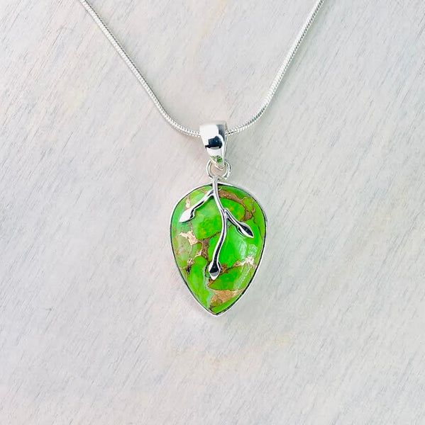 Green Mojave Turquoise Pendant with Silver Leaf Design Overlay.