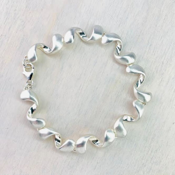 Matt and Polished Silver Curved 'Wiggly' Bracelet by JB Designs.