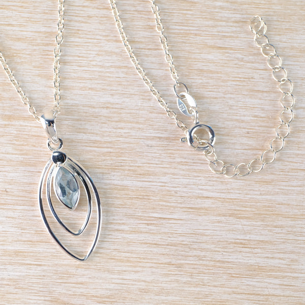 Marquise Shaped Silver and Blue Topaz Pendant.